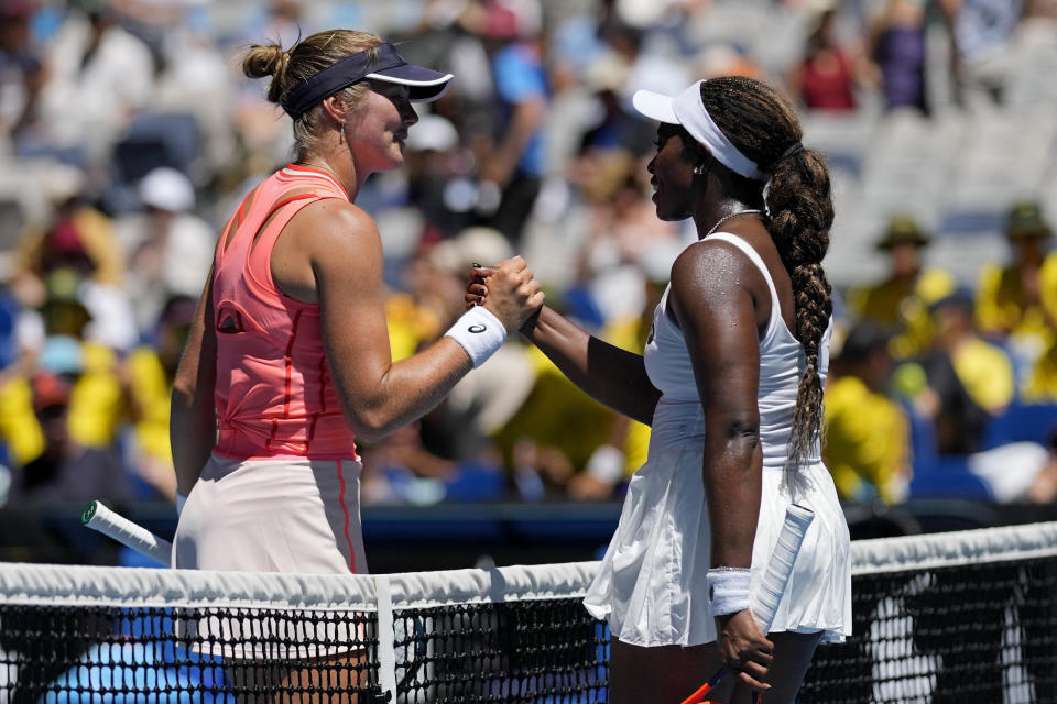 Sloane Stephens, right, of the U.S. is congratulated by Olivia Gadecki of Australia following their first round match at the Australian Open tennis championships at Melbourne Park, Melbourne, Australia, Tuesday, Jan. 16, 2024. (AP Photo/Louise Delmotte)