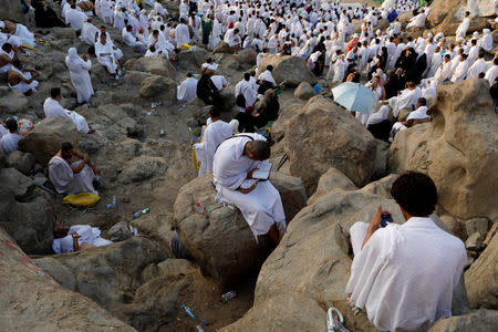 Muslim pilgrims gather on Mount Mercy on the plains of Arafat during the annual haj pilgrimage, outside the holy city of Mecca, Saudi Arabia August 20, 2018. REUTERS/Zohra Bensemra