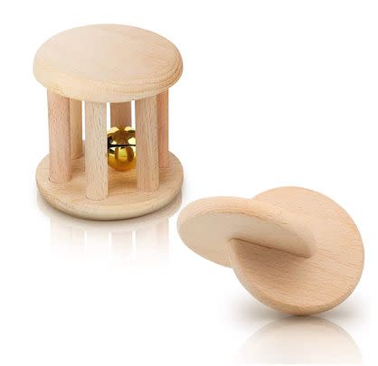 A wooden rattle and teether set