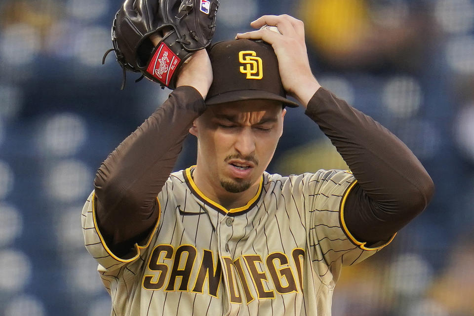 San Diego Padres starting pitcher Blake Snell collects himself between pitch during the first inning of a baseball game against the Pittsburgh Pirates in Pittsburgh, Tuesday, April 13, 2021. (AP Photo/Gene J. Puskar)