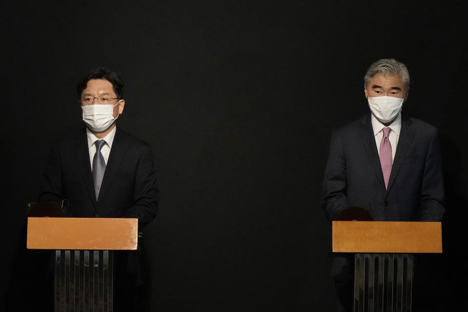 U.S. Special Representative for North Korea, Sung Kim, right, speaks during a briefing after a meeting with South Korea's Special Representative for Korean Peninsula Peace and Security Affairs Noh Kyu-duk at a hotel in Seoul, South Korea, Sunday, Oct. 24, 2021. (AP Photo/Ahn Young-joon, Pool)