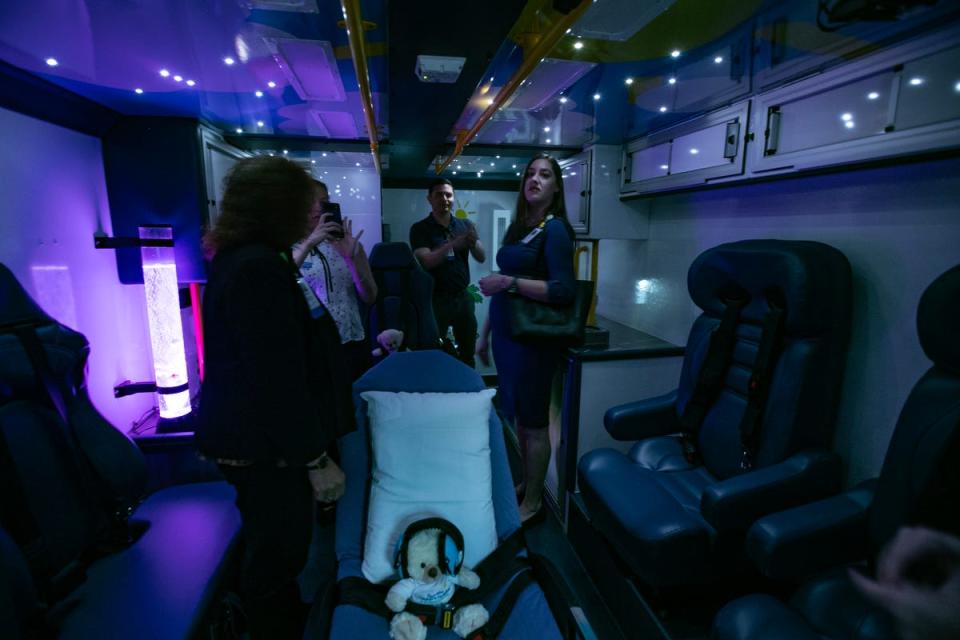 Visitors tour the new sensory-friendly ambulance to be used by Golisano Children's Hospital. During a media conference on Friday, April 26, 2024, representatives of Lee Health's Golisano Children's Hospital of Southwest Florida announced the hospital has been designated as Florida's first Certified Autism Center and is now outfitted with the area's first sensory-friendly ambulance.