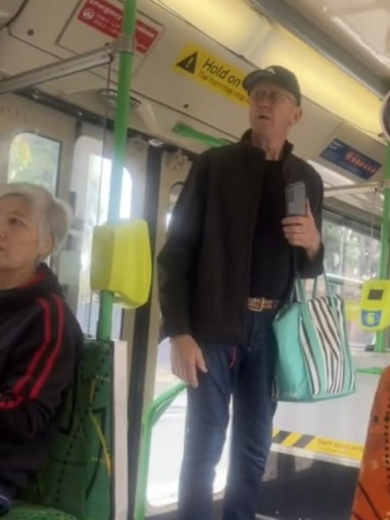In the footage, the man is heard accosting the woman over her shirt, claiming its message about Aboriginal genocide was "offensive" to him. Picture: Supplied / TikTok