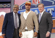 Indiana wide receiver Cody Latimer poses for photos with NFL commissioner Roger Goodell, right, and former Denver Broncos halfback Gene Mingo after being selected by the Denver Broncos as the 56th pick during the second round of the 2014 NFL Draft, Friday, May 9, 2014, in New York. (AP Photo/Jason DeCrow)