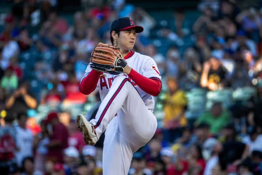 Angels starting pitcher and two-way player Shohei Ohtani delivers a pitch against the Pittsburgh Pirates on July 21, 2023..