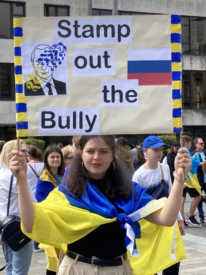 Maria Lytvynova from Ukraine takes part in a rally to raise for support for her home country at Custom House Square in Belfast (Rebecca Black/PA)