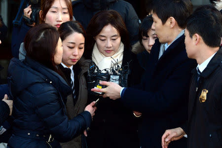 Culture Minister Cho Yoon-sun leaves after attending a court hearing to review a detention warrant request against her at the Seoul Central District court in Seoul, South Korea, January 20, 2017. Lee Kwang-ho/News1 via REUTERS