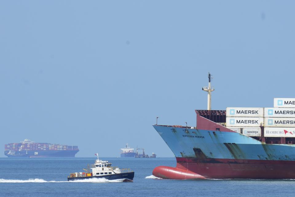 FILE - A cargo ship sails toward the Pacific Ocean after its transit though the Panama Canal, as seen from Panama City, Aug. 3, 2023. The canal announced on May 30, 2024 an increase in the maximum permissible draft to accommodate bigger ships. (AP Photo/Arnulfo Franco, File)