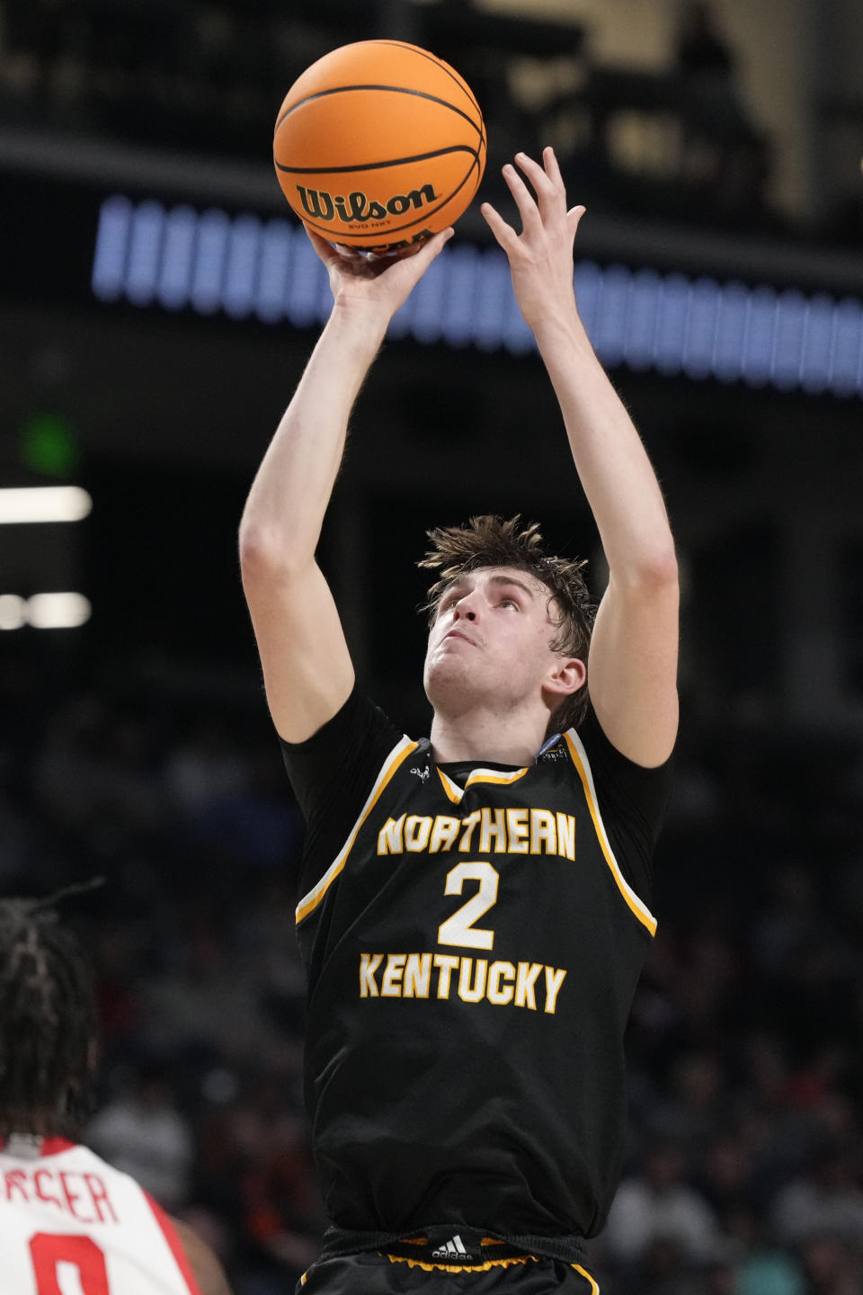 Northern Kentucky guard Sam Vinson (2) attempts a 3-point shot against Houston during the first half of a first-round college basketball game in the men's NCAA Tournament in Birmingham, Ala., Thursday, March 16, 2023. (AP Photo/Rogelio V. Solis)