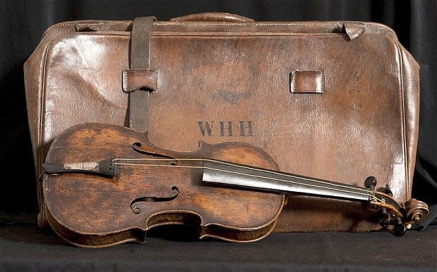This is a valise and the violin of Wallace H. Hartley, age 33, the Titanic's Band Master, whose body was found April 25, 1912.  The Titanic violin is on display this wee at the Titanic Museum Attraction in Pigeon Forge, Tenn.