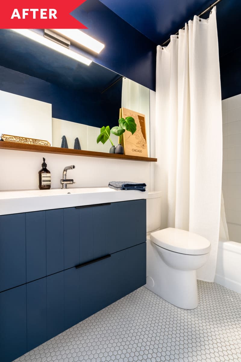 bathroom hexagon tile floors blue cabinets