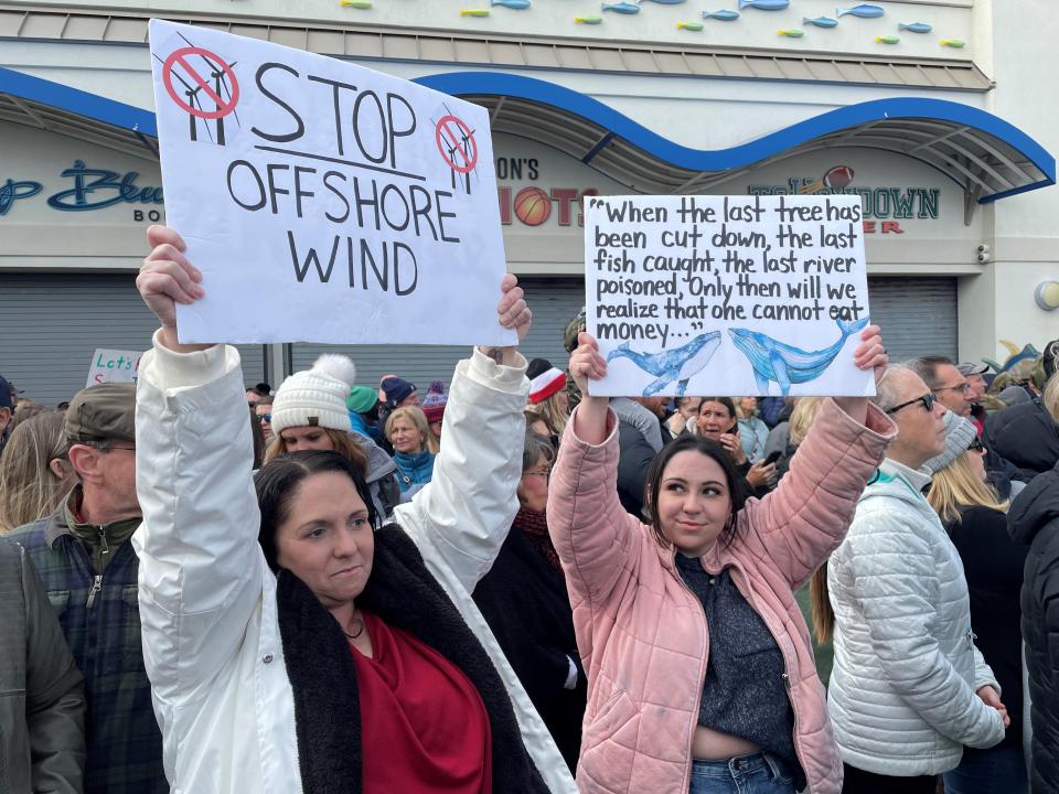 Jayme Unger and Courtney White, both of the Bayville section of Berkeley, protest in a "Save the Whales" rally in Point Pleasant Beach on Sunday, Feb. 19, 2023.