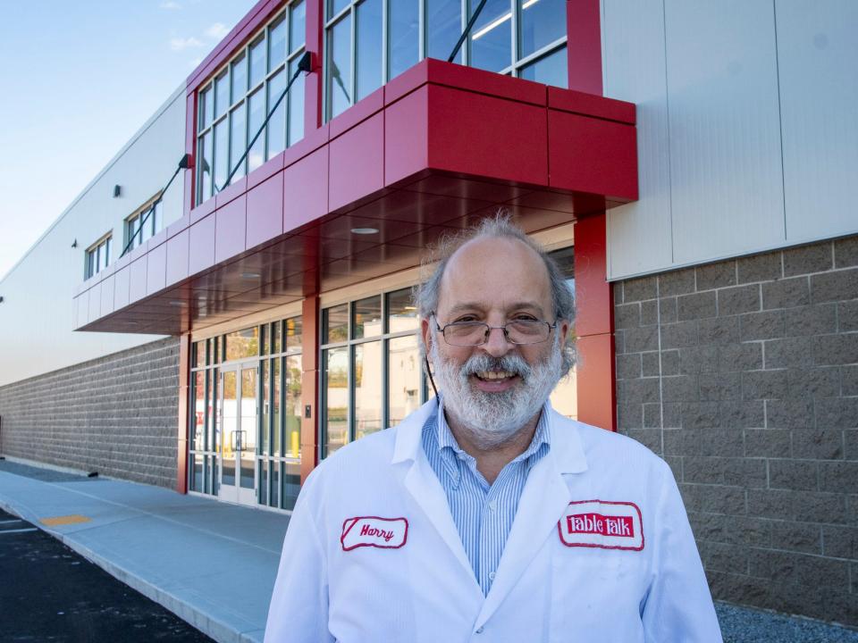 Table Talk Pies President Harry Kokkinis stands outside the company's headquarters and bakery facility in Main South.