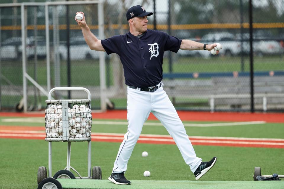 Quality Control Coach Josh Paul makes a throw during Detroit Tigers spring training at TigerTown in Lakeland, Fla., Thursday, Feb. 20, 2020.