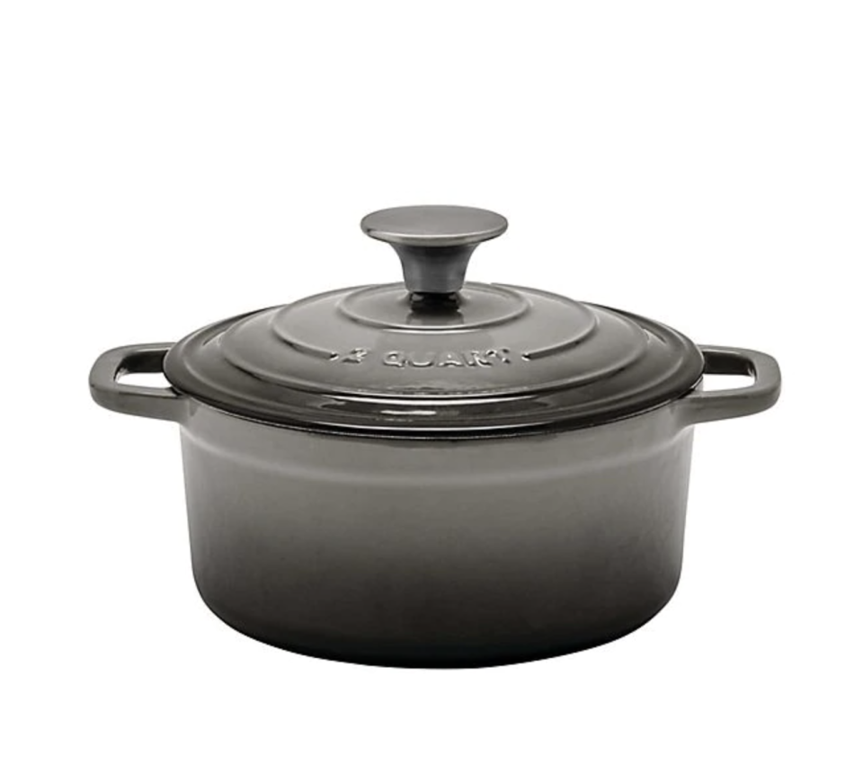 Artisanal Kitchen Supply Enameled Cast Iron Dutch Oven in Grey. Image via Bed, Bath and Beyond.