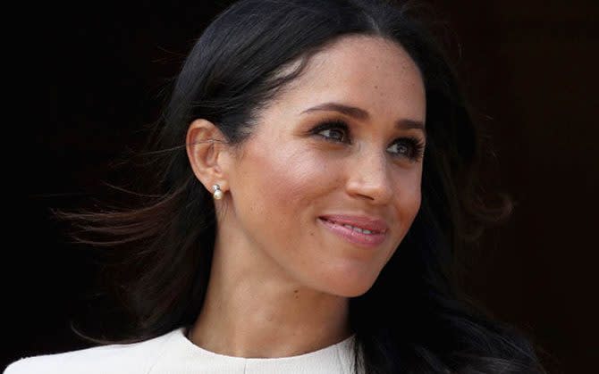 Meghan wearing the pearl and diamond earrings  -  Getty Images