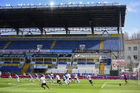 Parma and Spal play their Serie A soccer match in the empty Tardini stadium, in Parma, Italy, Sunday, March 8, 2020. Parma-Spal, the first match of the day, kicked off after a 75-minute delay inside an empty stadium as officials considered an appeal to suspend the games in Italy’s top soccer division from sports minister Vincenzo Spadafora, minutes before the scheduled start. (Piero Cruciatti/LaPresse via AP)