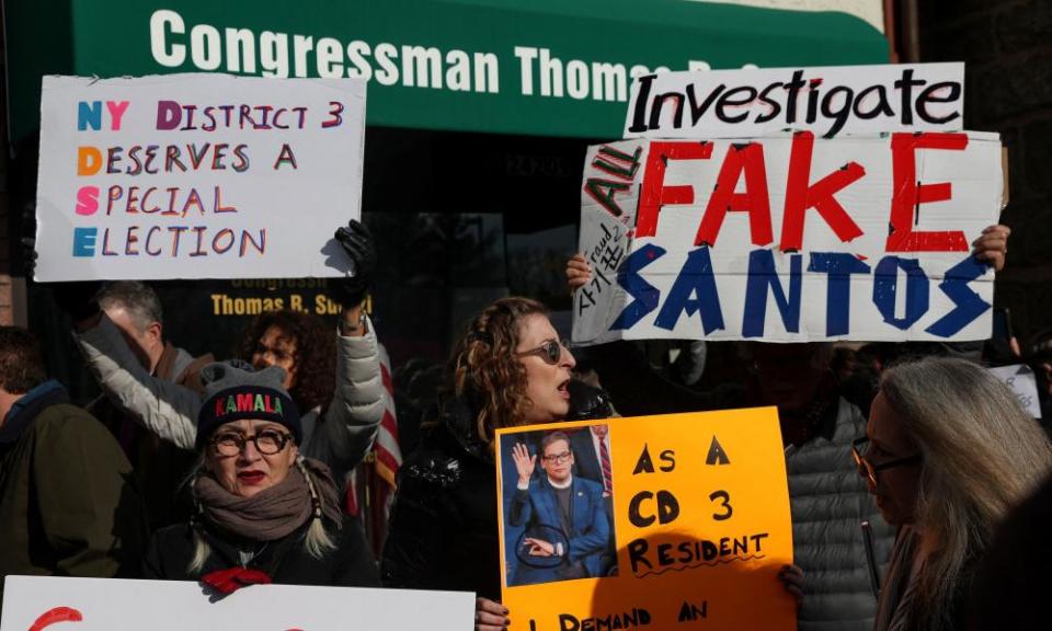 People protest against George Santos in Queens, New York, on 7 January.