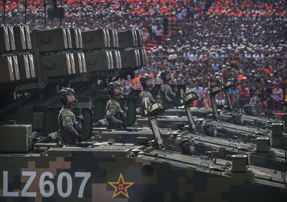 Chinese soldiers sit atop mobile rocket launchers inn 2019 during a parade to celebrate the 70th Anniversary of the founding of the People's Republic of China. Source: Getty