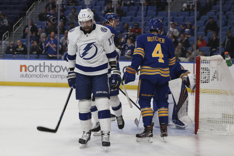 Tampa Bay Lightning left wing Alex Killorn (17) celebrates after scoring a goal during the first period of an NHL hockey game against the Buffalo Sabres, Monday, Oct. 25, 2021, in Buffalo, N.Y. (AP Photo/Joshua Bessex)