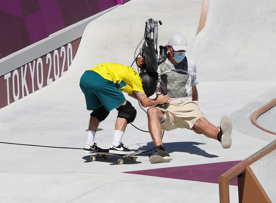 <p>Kieran Woolley of Team Australia crashes into a TV Cameraman during the Men's Skateboarding Park Preliminary Heat 3 on day thirteen of the Tokyo 2020 Olympic Games at Ariake Urban Sports Park on August 05, 2021 in Tokyo, Japan. (Photo by Jamie Squire/Getty Images)</p> 
