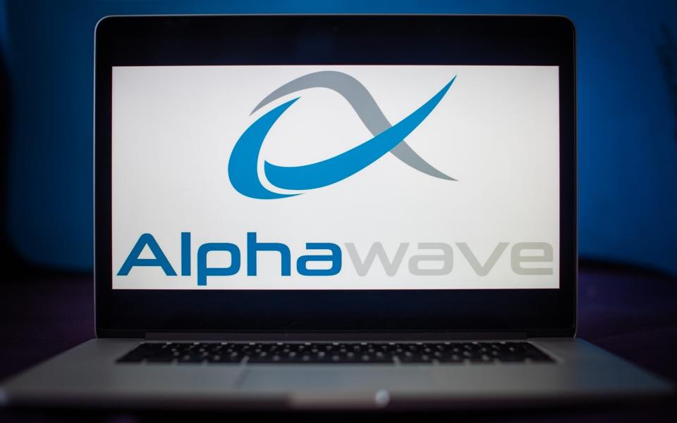 The Alphawave logo on a laptop screen