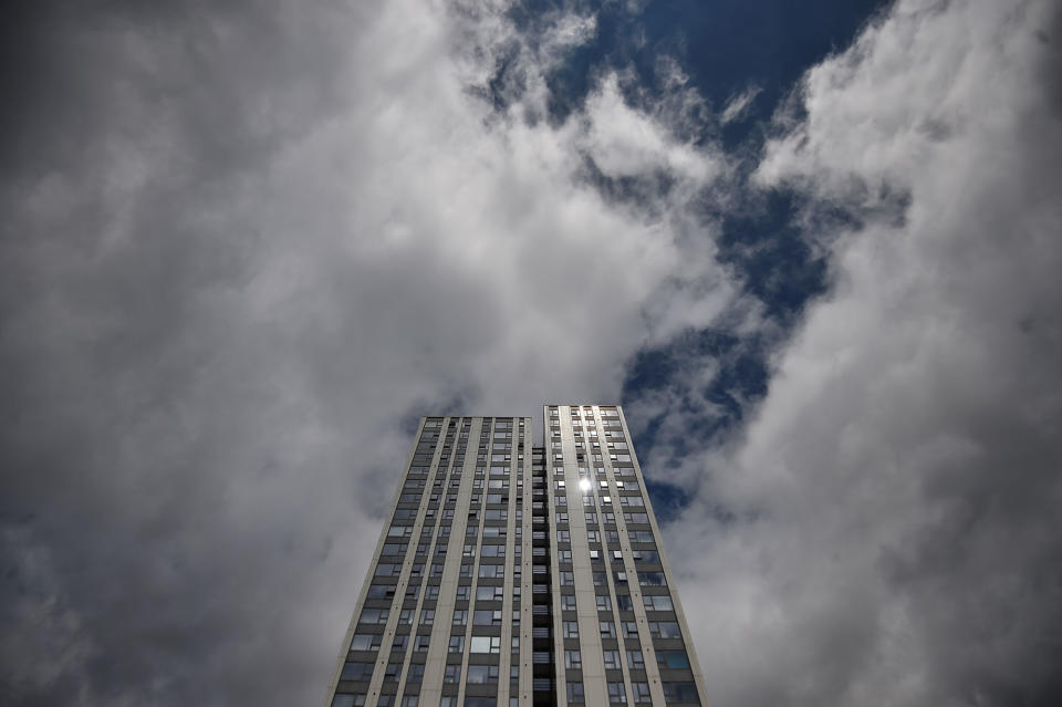 <p>The sun glints off a window in the Dorney Tower residential block, from where residents were evacuated as a precautionary measure following concerns over the type of cladding used on the outside of the buildings on the Chalcots Estate in north London, Britain, June 25, 2017. (Photo: Hannah McKay/Reuters) </p>