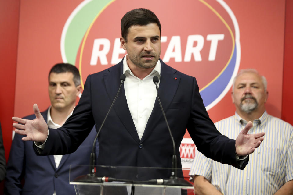 Opposition leader Davor Bernardic of the liberal-left Restart coalition addresses his supporters in Zagreb, Croatia, Sunday, July 5, 2020. The ruling conservatives overwhelmingly won Croatia's parliamentary elections held Sunday amid a spike in new coronavirus cases as the latest European Union member state leaned further to the right. SDP leader Bernardic conceded the defeat and suggested he would resign the leadership position. (AP Photo/Daniel Kasap)