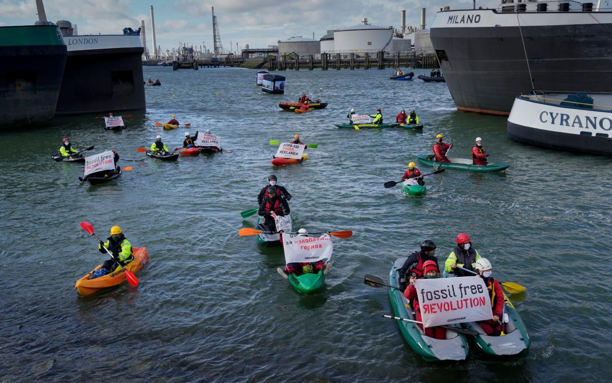 Shell faces activist pressure to go green, but oil's days are also numbered - AP Photo/Peter Dejong