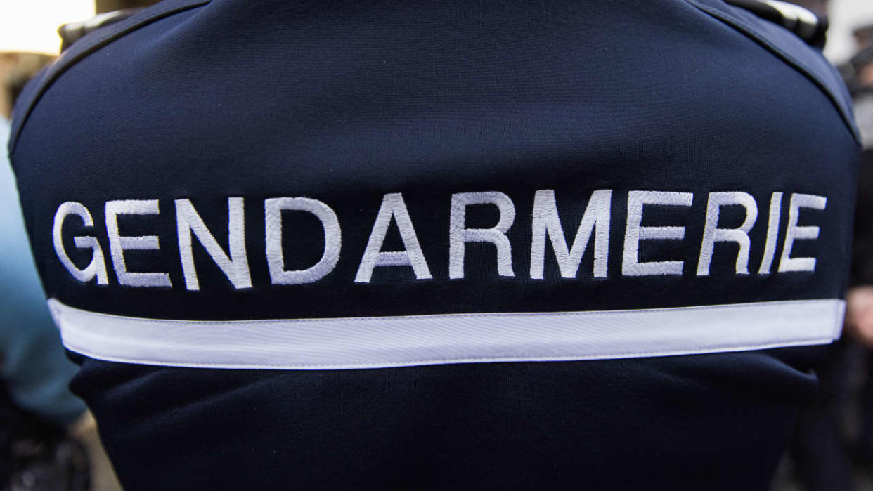 A picture shows a logo of the Gendarmerie at a gendarmerie brigade in Ouistreham, north-western France, on December 13, 2021. (Photo by Sameer Al-DOUMY / AFP)