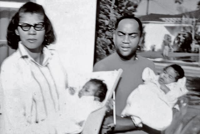 <p>Courtesy of RuPaul</p> RuPaul with his mother, Ernestine, as an infant in 1960, with his father Irving holding his cousin