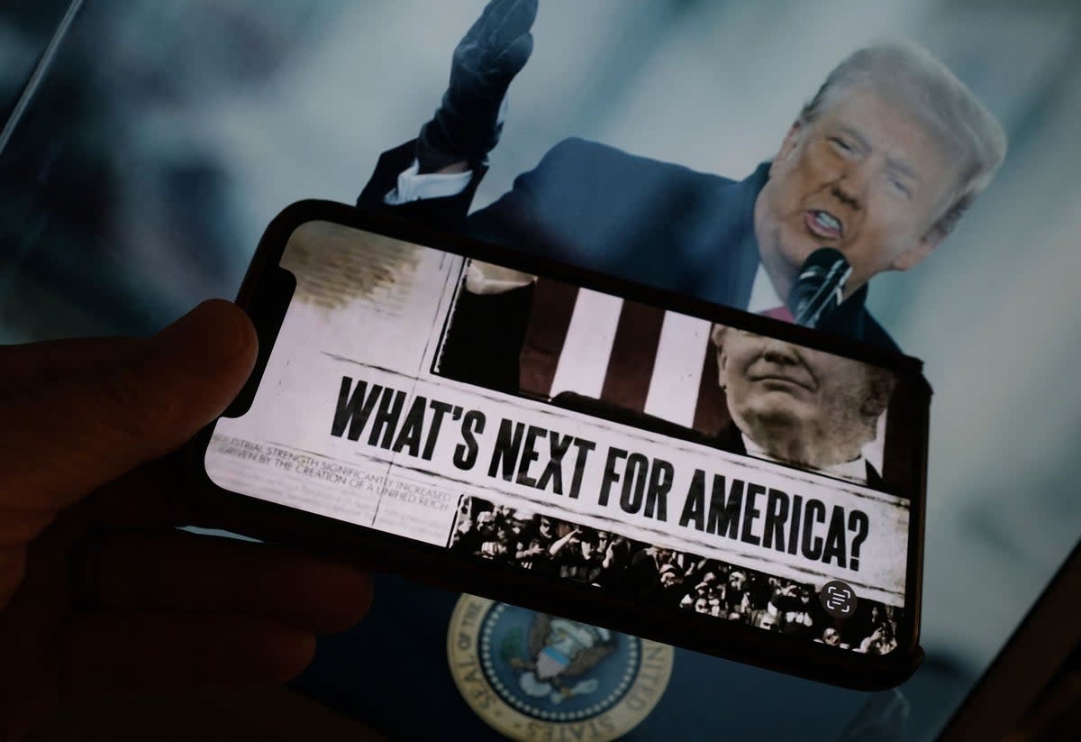 A frame from the video posted on Donald Trump's Truth Social account, displayed on a smartphone (AFP via Getty Images)