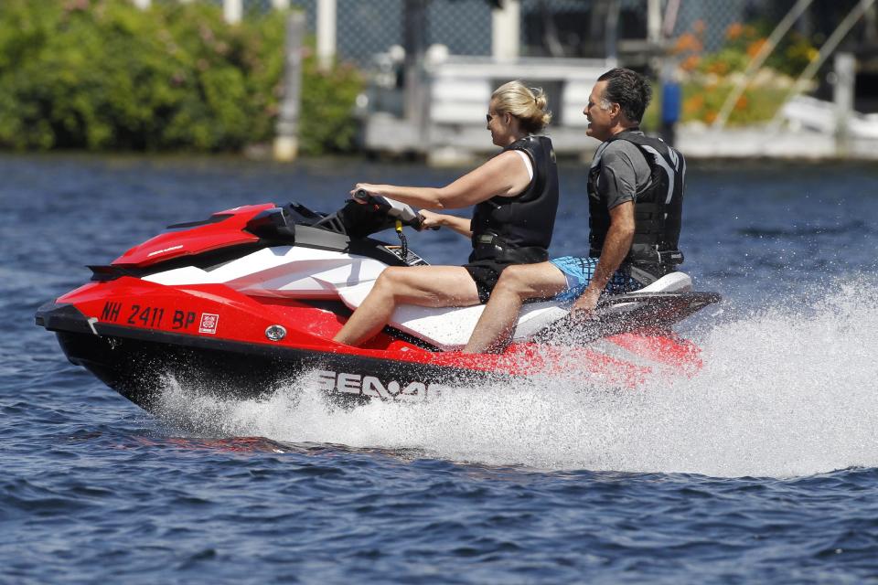 Republican presidential candidate, former Massachusetts Gov. Mitt Romney and wife Ann Romney jet ski on Lake Winnipesaukee in Wolfeboro, N.H., Monday, July 2, 2012, where Romney has a vacation home. (AP Photo/Charles Dharapak