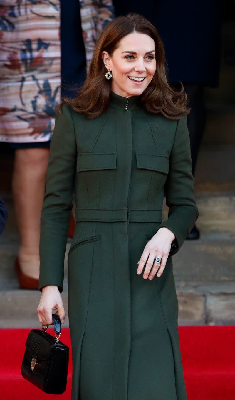 Kate Middleton's first royal engagement of 2020, which saw her visit Bradford, saw her accessorise with the black version of the Midi Mayfair bag. (PHOTO: Getty Images)