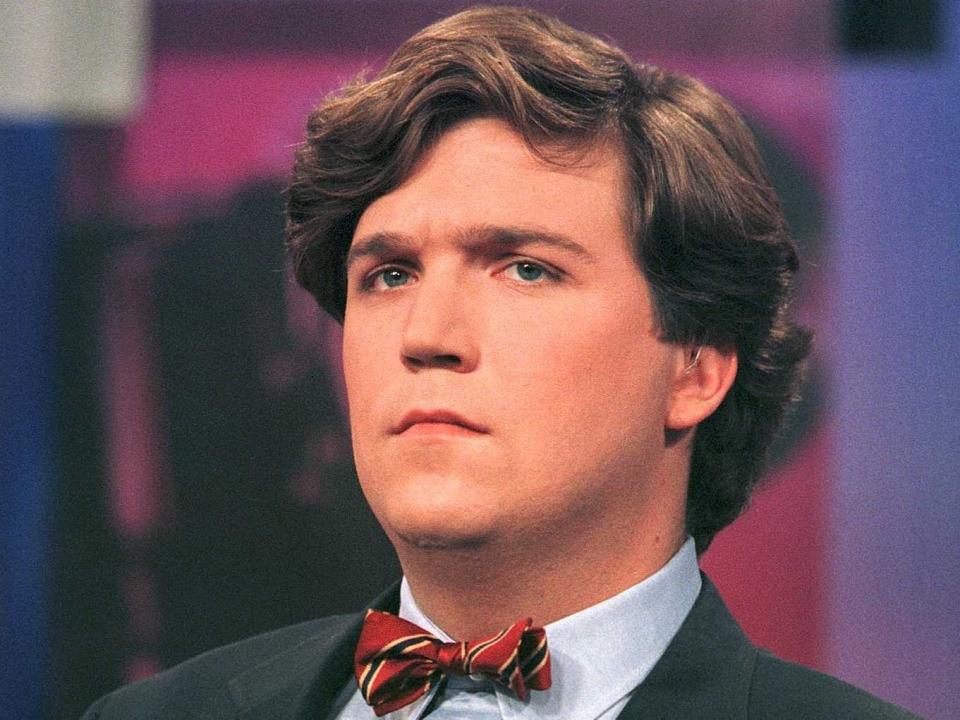 Tucker Carlson in 1998 during a CNN town hall