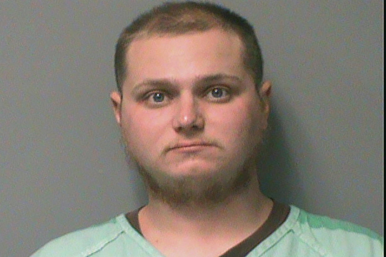 FILE - This Dec. 6, 2000 booking photo from the Polk County Jail in Des Moines, Iowa shows, Army veteran Michael McKinney. McKinney, a supporter of former President Donald Trump pleaded guilty Wednesday, June 16, 2021, to felony charges for firing his handgun into a carful of Black girls who were arguing with pro-Trump agitators near the Iowa Capitol last December, injuring one.  (Polk County Jail via AP File)