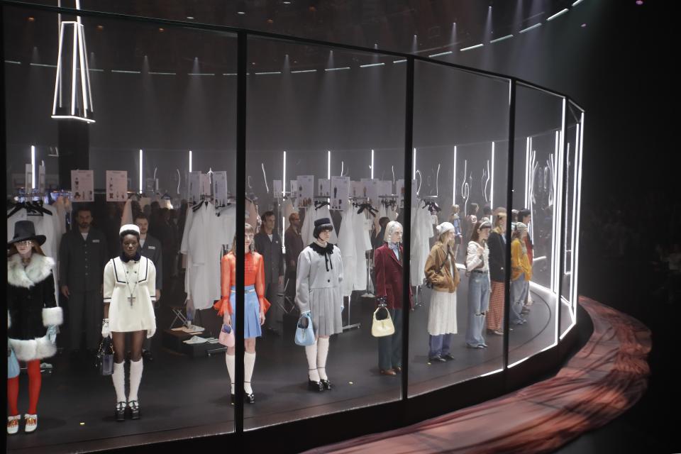 Models wear creations as part of Gucci's Fall/Winter 2020/2021 collection, presented in Milan, Italy, Wednesday, Feb. 19, 2020. (AP Photo/Luca Bruno)