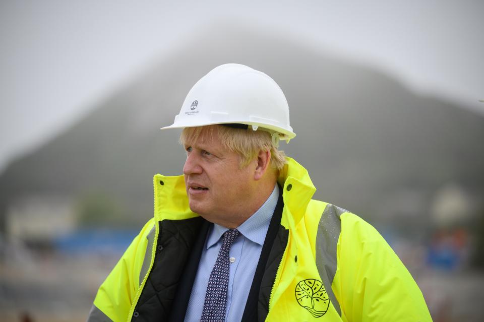 Boris Johnson visits a housing development in Cornwall on Wednesday, ahead of the G7 summit in the county (Getty)