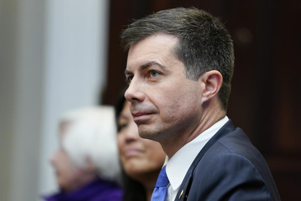 FILE - Transportation Secretary Pete Buttigieg attends a meeting with President Joe Biden's "Investing in America Cabinet," in the Roosevelt Room of the White House, Friday, May 5, 2023, in Washington. The federal agency that regulates pipelines on Friday, May 5, 2023, announced new rules aimed at reducing leaks of methane, a potent greenhouse gas, from a network of nearly 3 million miles of natural gas pipelines that crisscross the country. “Quick detection of methane leaks is an important way to keep communities safe and help curb climate change,” said Buttigieg. (AP Photo/Evan Vucci, File)