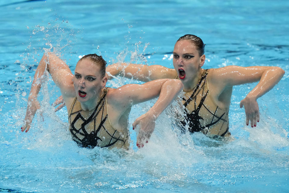 Svetlana Kolesnichenko and Svetlana Romashina of Russian Olympic Committee compete in the Free Routine Final at the 2020 Summer Olympics, Wednesday, Aug. 4, 2021, in Tokyo, Japan. (AP Photo/Dmitri Lovetsky)