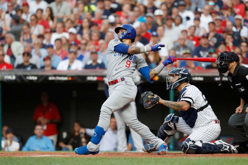 Javier Baez of the Chicago Cubs swings at a pitch during the 2019 All-Star Game in Cleveland.