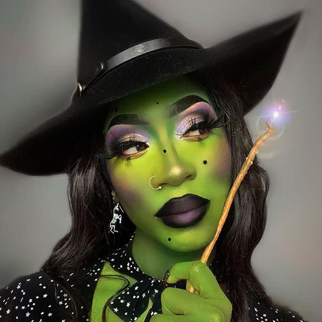 <p>We love all the extra touches—the extra long eyelashes, the rosy cheeks, and the black dots—to this wicked witch look. Don't forget to apply matching makeup to the hands and neck.</p><p><a class="link " href="https://www.amazon.com/Mehron-Makeup-CreamBlend-Stick-GREEN/dp/B0182U9O2O/?tag=syn-yahoo-20&ascsubtag=%5Bartid%7C10050.g.34196559%5Bsrc%7Cyahoo-us" rel="nofollow noopener" target="_blank" data-ylk="slk:SHOP GREEN MAKEUP;elm:context_link;itc:0;sec:content-canvas">SHOP GREEN MAKEUP</a></p><p><a href="https://www.instagram.com/p/CFnuMdrFFxT/?utm_source=ig_embed&utm_campaign=loading" rel="nofollow noopener" target="_blank" data-ylk="slk:See the original post on Instagram;elm:context_link;itc:0;sec:content-canvas" class="link ">See the original post on Instagram</a></p>