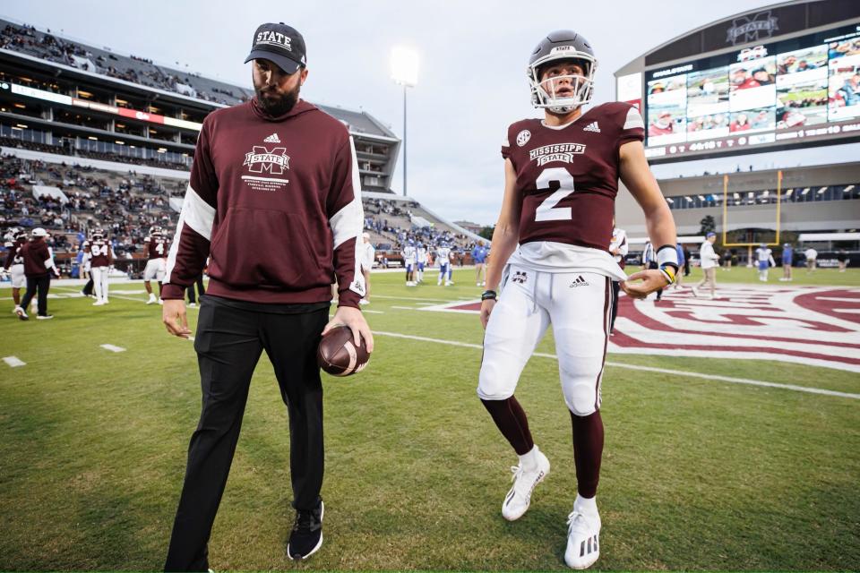 Mississippi State inside receivers coach Drew Hollingshead with quarterback Will Rogers.
