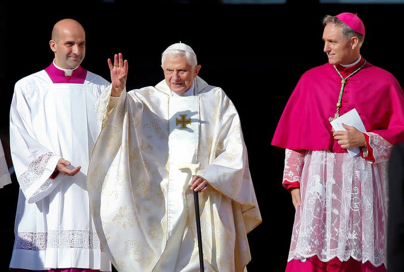 FILE PHOTO: Emeritus Pope Benedict XVI waves as he arrives to attend a mass for the beatification of former pope Paul VI in St. Peter's square at the Vatican