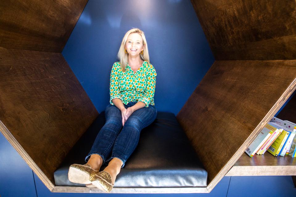 Katy Herbold, Sidekick Coffee & Books owner, poses for a photo, Thursday, Sept., 26, 2019, at 1310 1/2 Melrose Avenue in University Heights, Iowa.