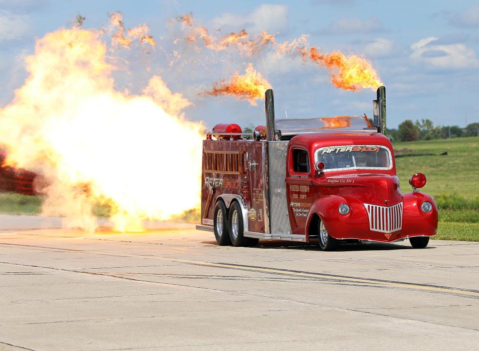 Aftershock, the world's fastest jet fire truck, passes by the crowd during the Central Iowa Airshow at the Ankeny Regional Airport, 3700 Southeast Convenience Boulevard, on Saturday, Aug. 24, 2019.