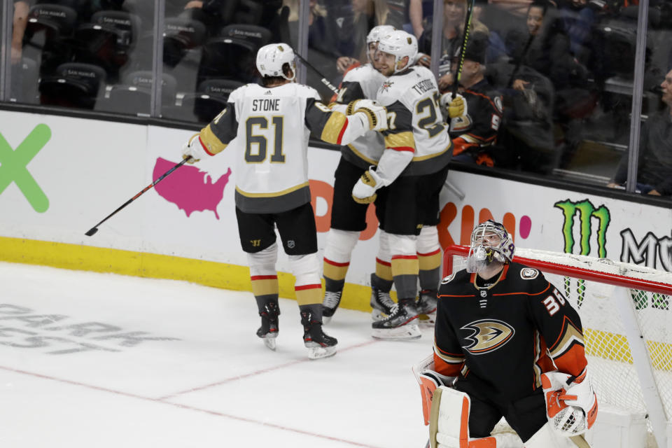 Anaheim Ducks goaltender John Gibson reacts after giving up the game winning goal to Vegas Golden Knights defenseman Shea Theodore during overtime in an NHL hockey game in Anaheim, Calif., Sunday, Feb. 23, 2020.The Golden Knights won 6-5. (AP Photo/Chris Carlson)