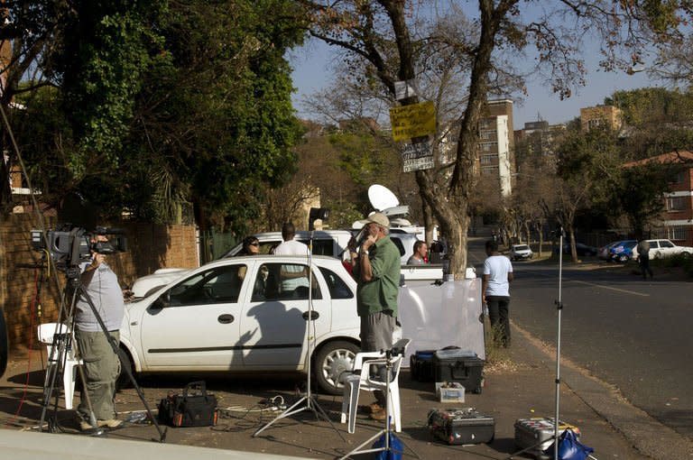 Members of the media camp outside the Mediclinic Heart Hospital in Pretoria on June 8, 2013. Mandela was in a "serious but stable" condition in hospital on Saturday night with a renewed lung infection that has triggered worldwide concern for the South African hero