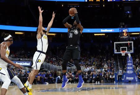 Jan 31, 2019; Orlando, FL, USA; Orlando Magic guard Terrence Ross (31) shoos over Indiana Pacers guard Cory Joseph (6) during the second half at Amway Center. Mandatory Credit: Kim Klement-USA TODAY Sports