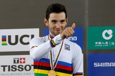 Cycling - UCI Track World Championships - Men's Omnium - Hong Kong, China – 15/4/17 - France's Benjamin Thomas poses with gold medal. REUTERS/Bobby Yip
